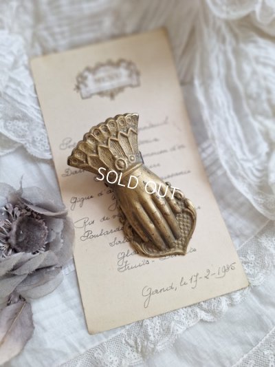 antiquehandclip